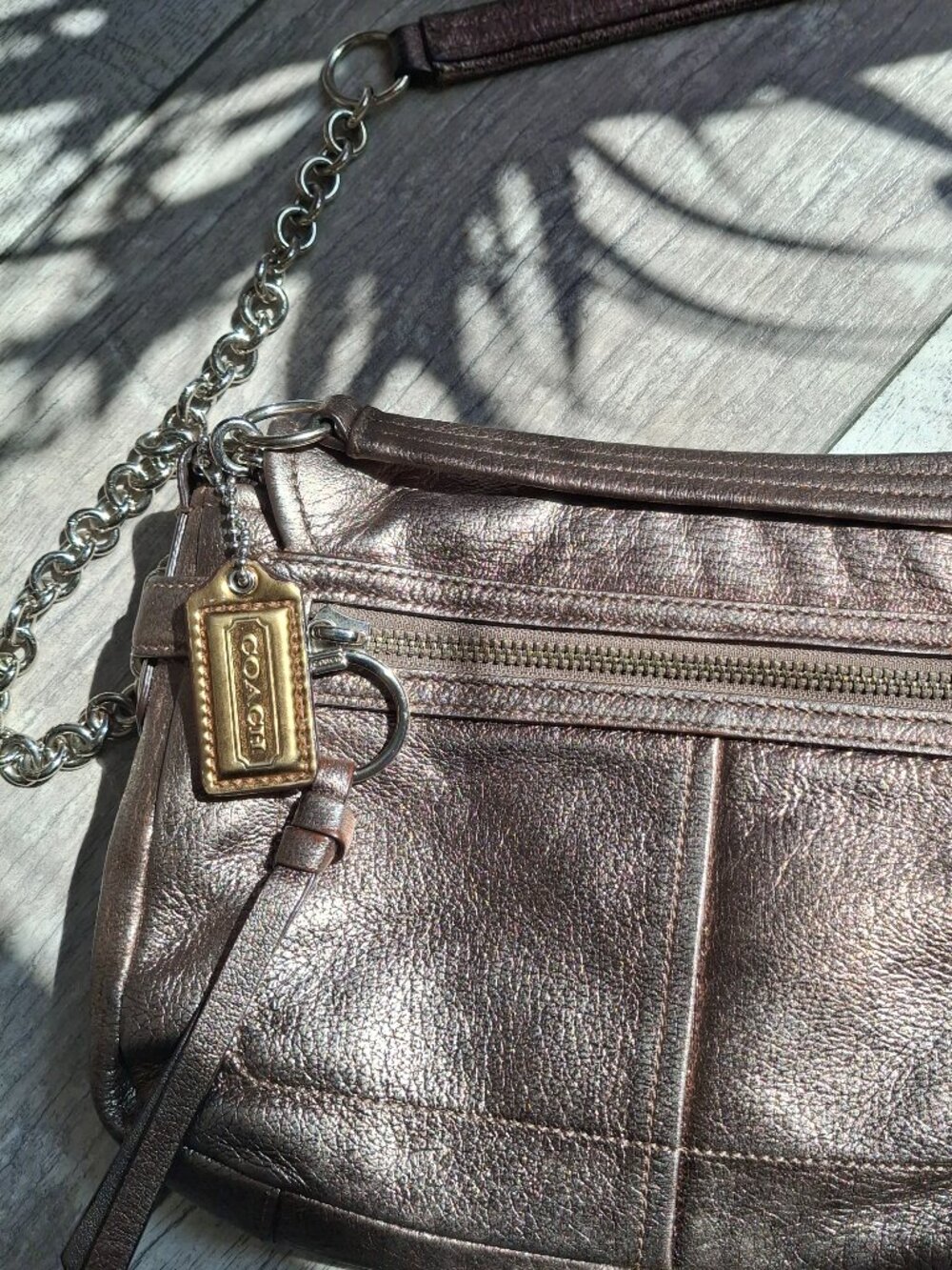 Metallic gold Coach crossbody